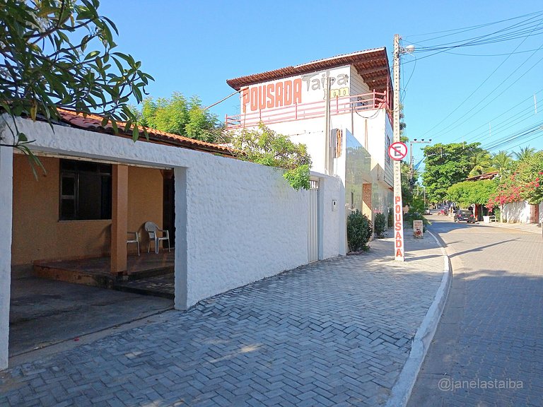 Nice little house close to the sea on the main street of Tai
